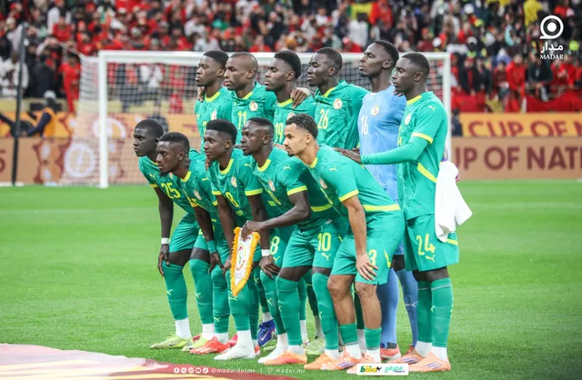 Les joueurs du Sénégal en maillot vert posant pour la photo d'équipe avant un match de la CAN, photo d'archives