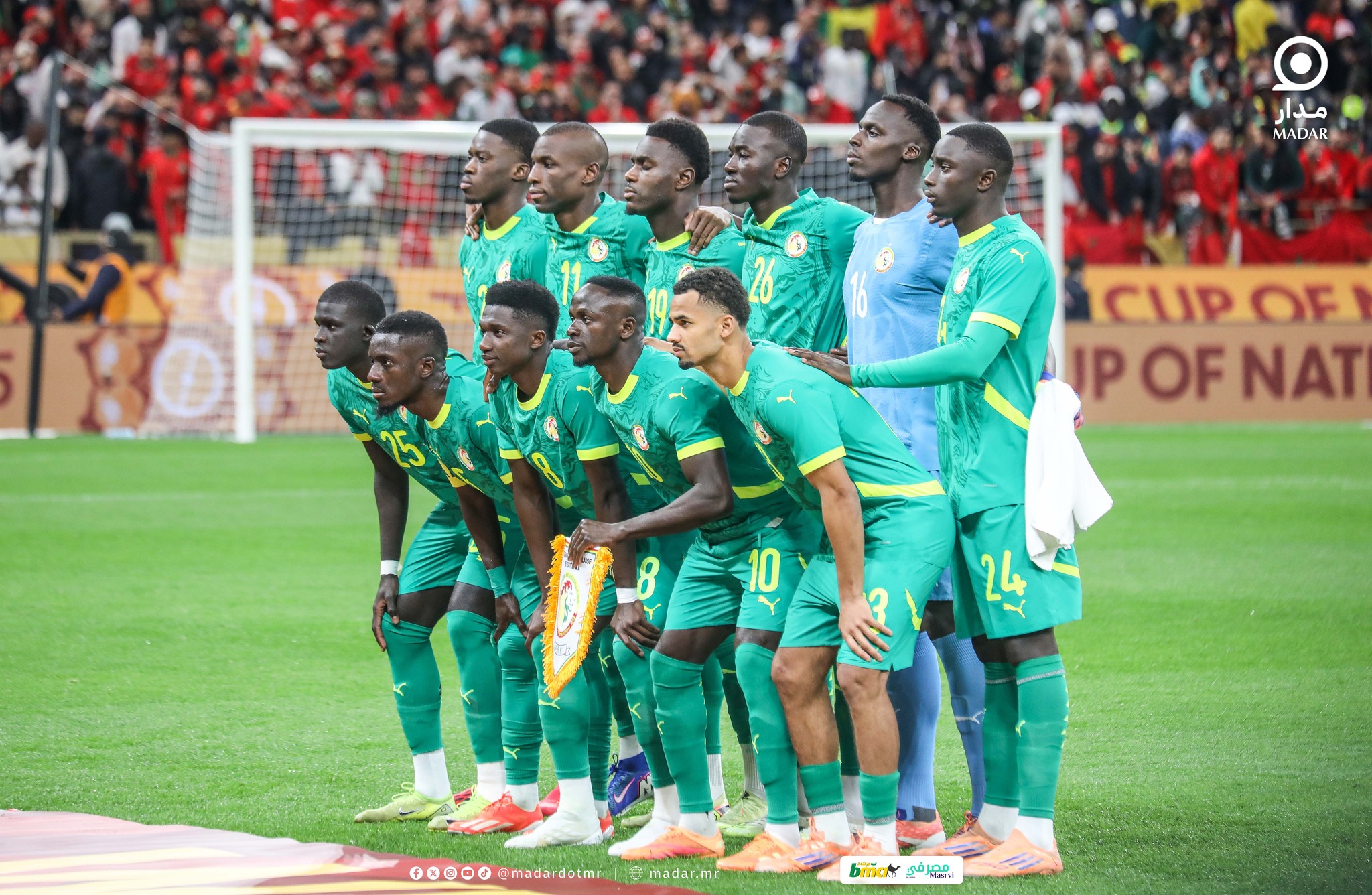 Les joueurs du Sénégal en maillot vert posant pour la photo d'équipe avant un match de la CAN, photo d'archives