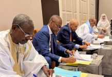 Les parties participant au dialogue signent le document de référence